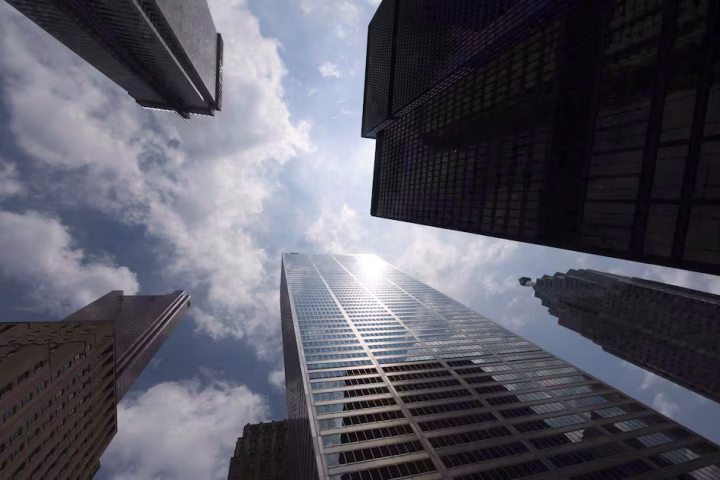 Bank towers are shown from Bay Street in Toronto's financial district, on Wednesday, June 16, 2010. THE CANADIAN PRESS/Adrien Veczan